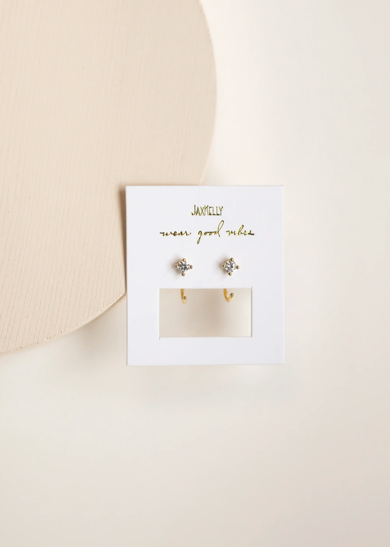 White Huggie Earrings